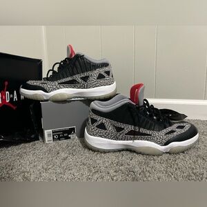 Jordan 11 Low IE Black Cement